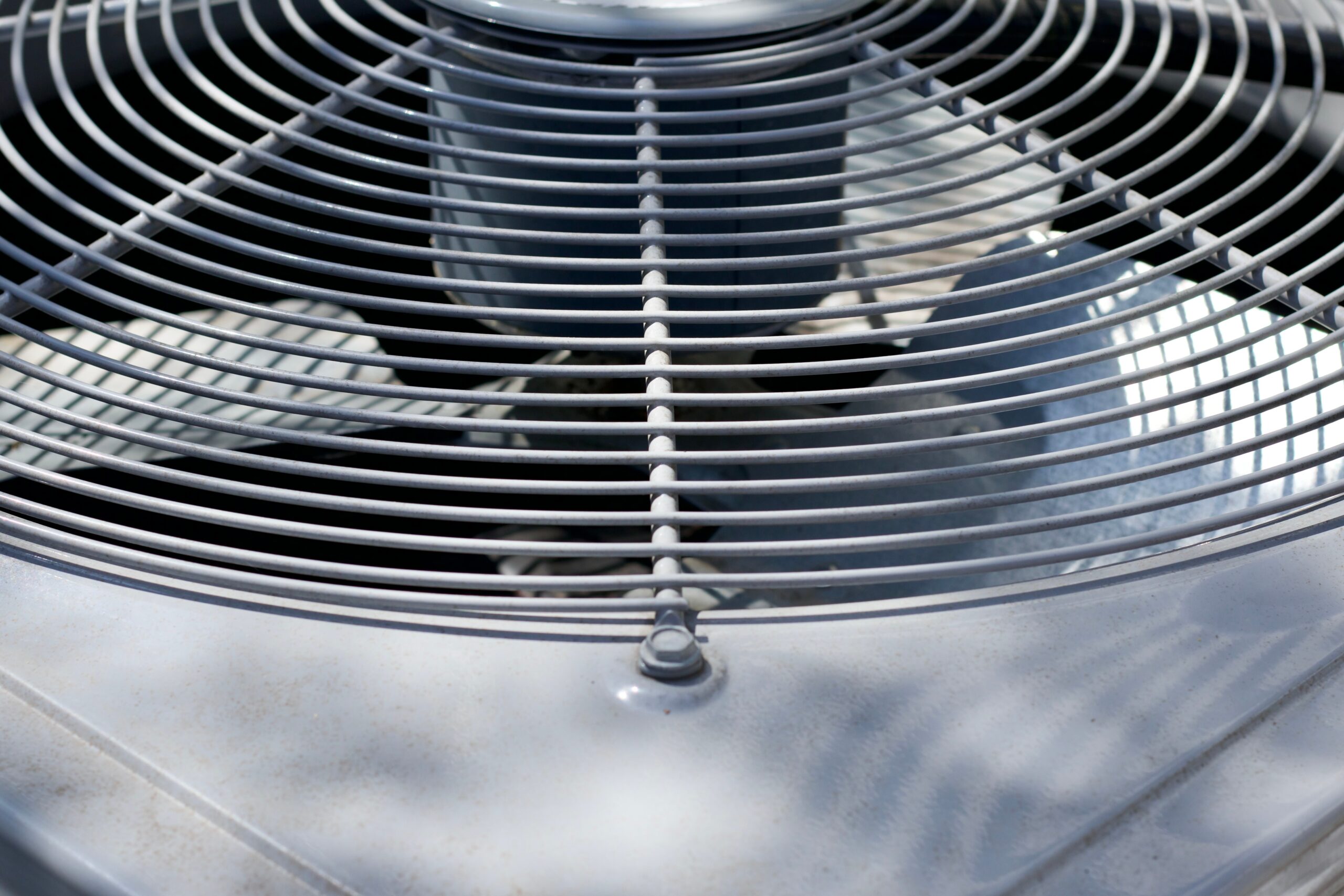 Outdoor AC unit with non-spinning condenser fan that needs repair